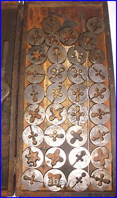 Antique Early die 36 pieces set mix lot included F. E. Wells & Sons Die pat 1912