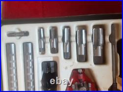 Pipe tap and die set in a metal case